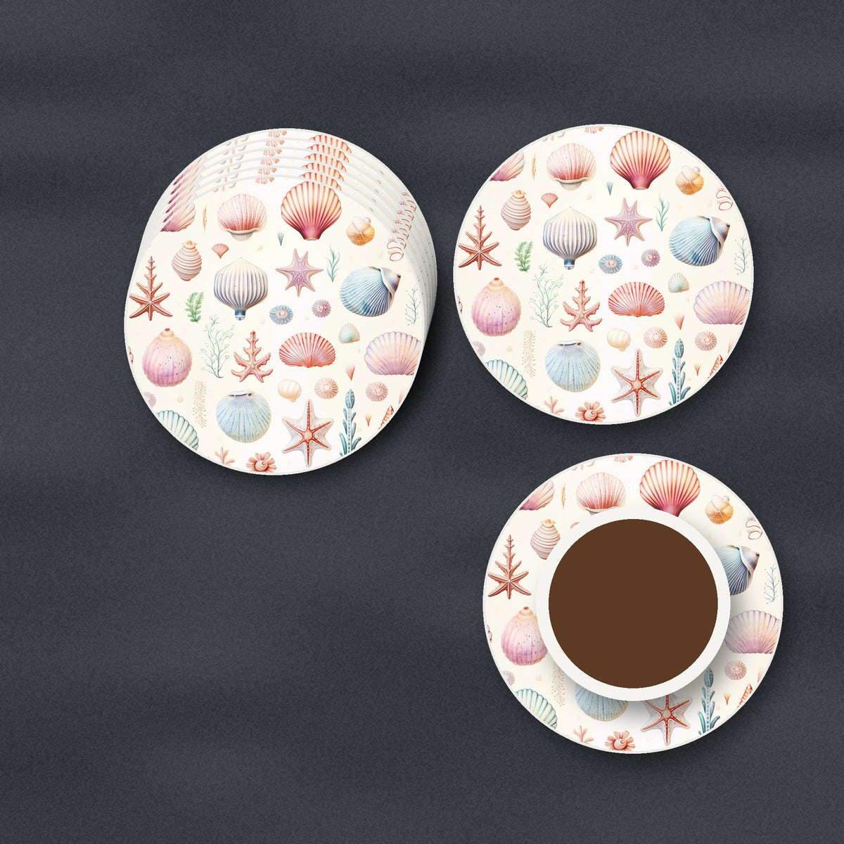 Seashell Pattern round ceramic coasters stacked on a slate kitchen worktop