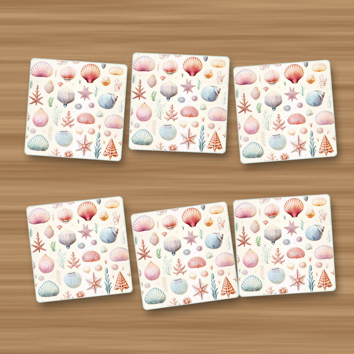 Seashell Pattern square glass coasters, set of 6, on an oak coffee table