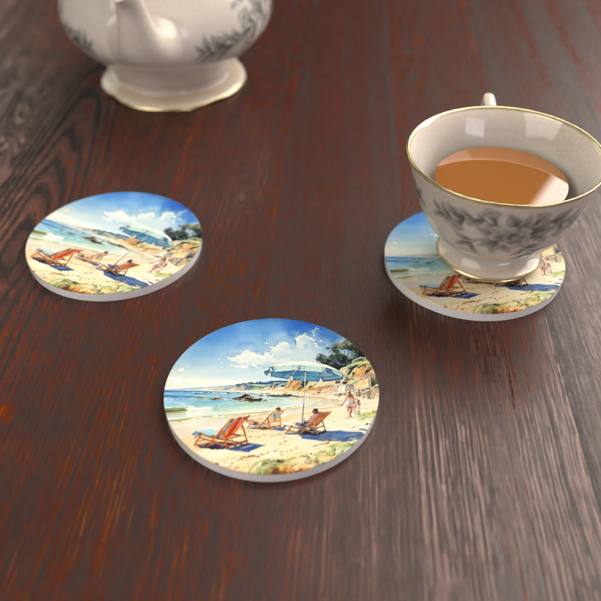 Beach Day with a Blue Parasol Round Ceramic Coasters – Set of 6 – lifestyle mockup with a teacup