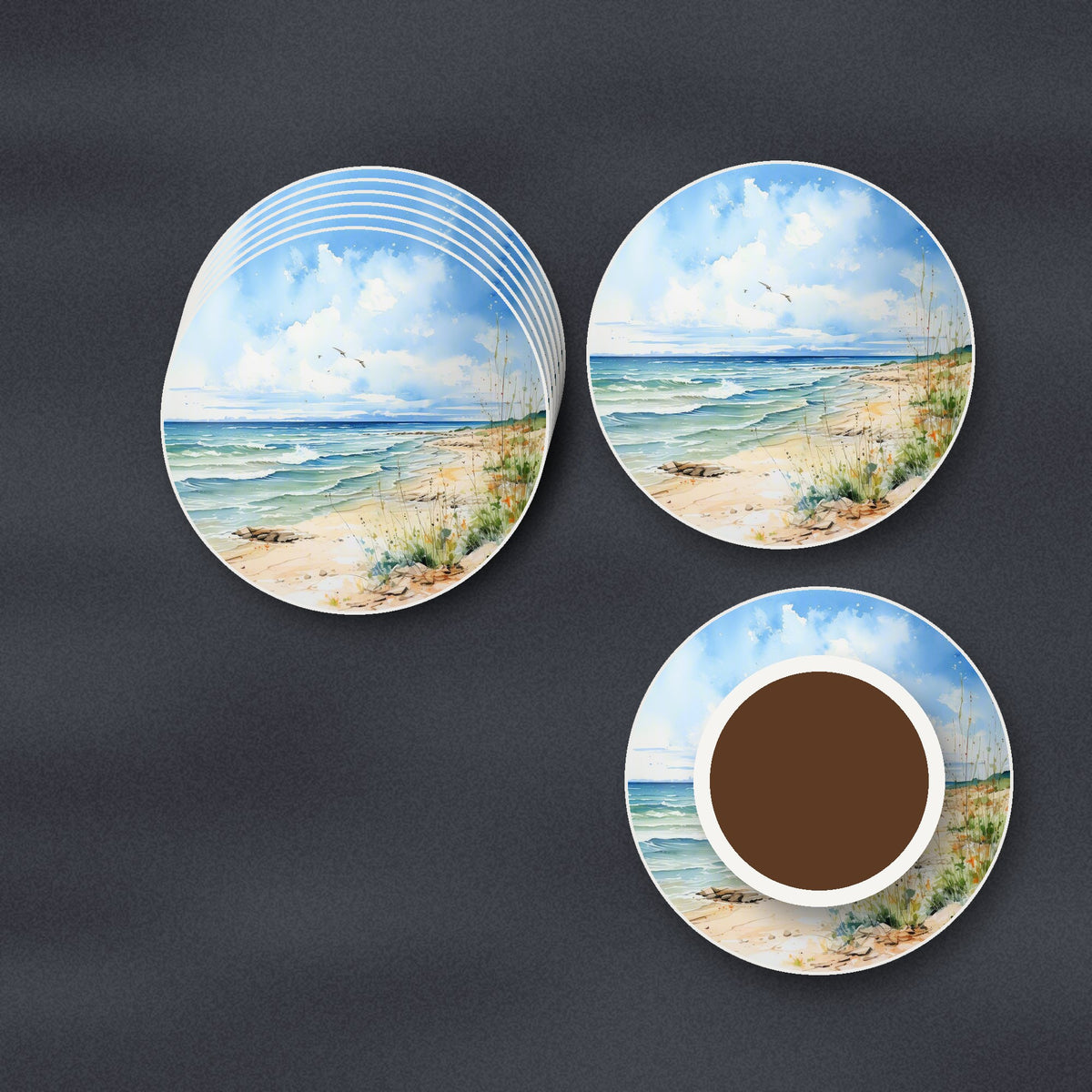 Dunes & Breaking Waves round ceramic coasters stacked on a slate kitchen worktop