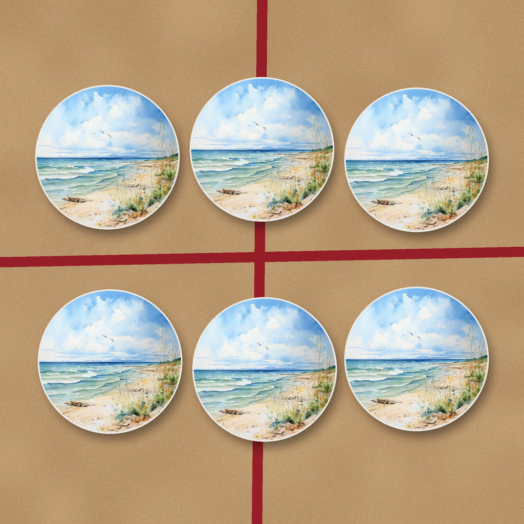 Dunes & Breaking Waves round ceramic coasters on kraft gift wrap
