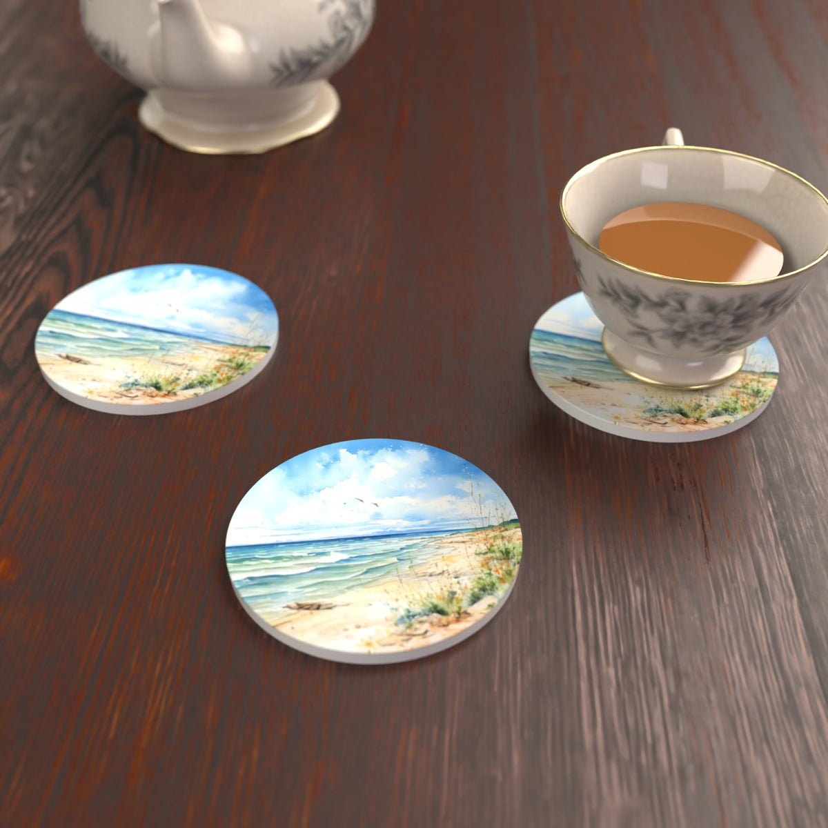 Dunes & Breaking Waves Round Ceramic Coasters – Set of 6 – lifestyle mockup with a teacup