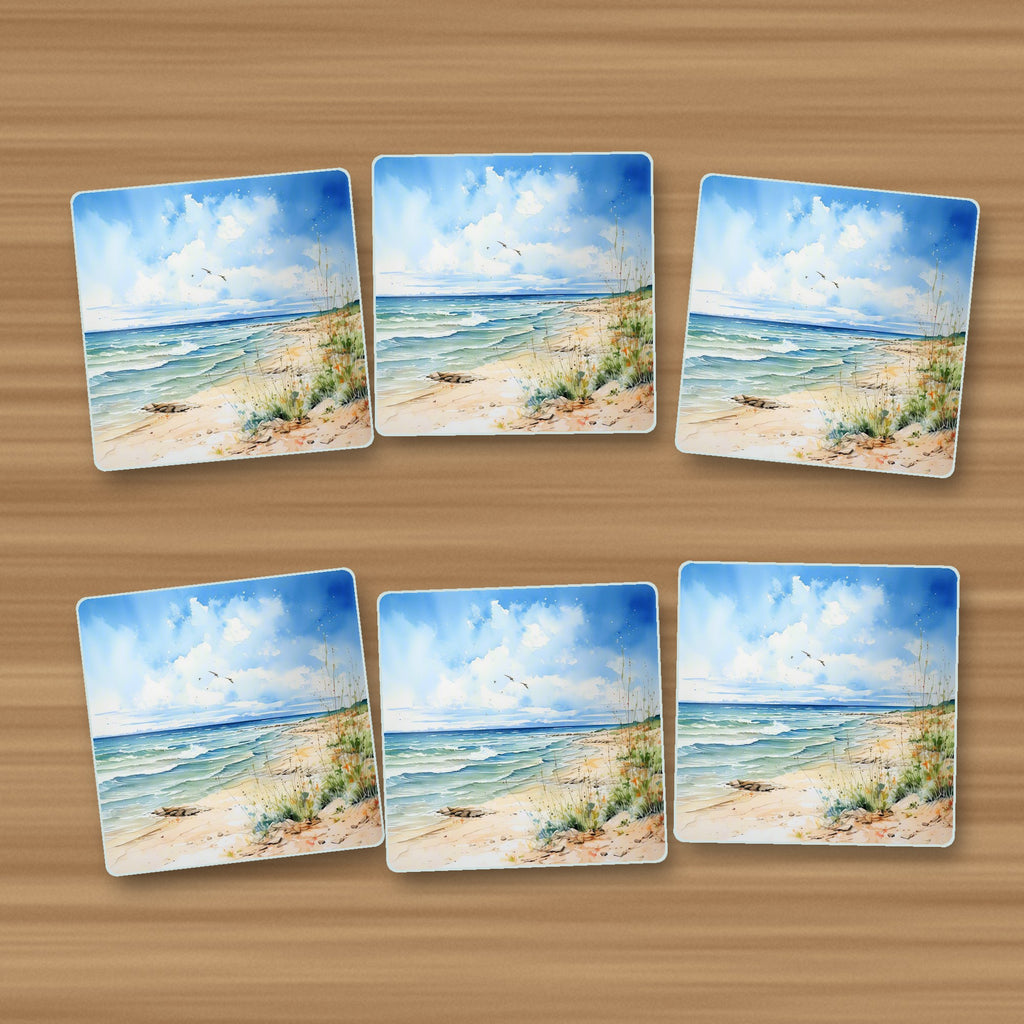Dunes & Breaking Waves square glass coasters, set of 6, on an oak coffee table