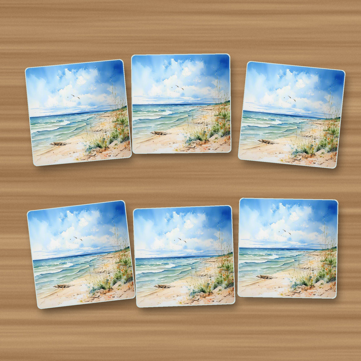Dunes & Breaking Waves square glass coasters, set of 6, on an oak coffee table