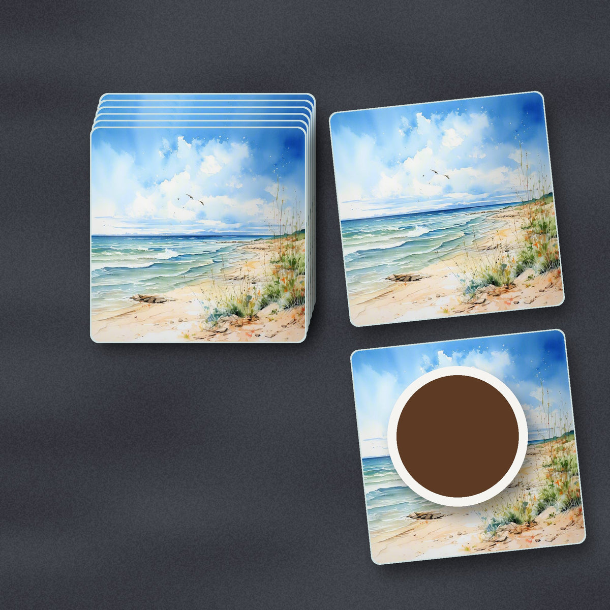 Dunes & Breaking Waves square glass coasters stacked on a slate kitchen worktop