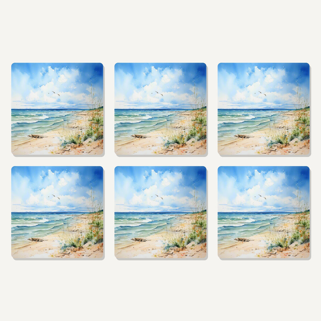 Flat lay of the dunes & breaking waves artwork on six square coasters