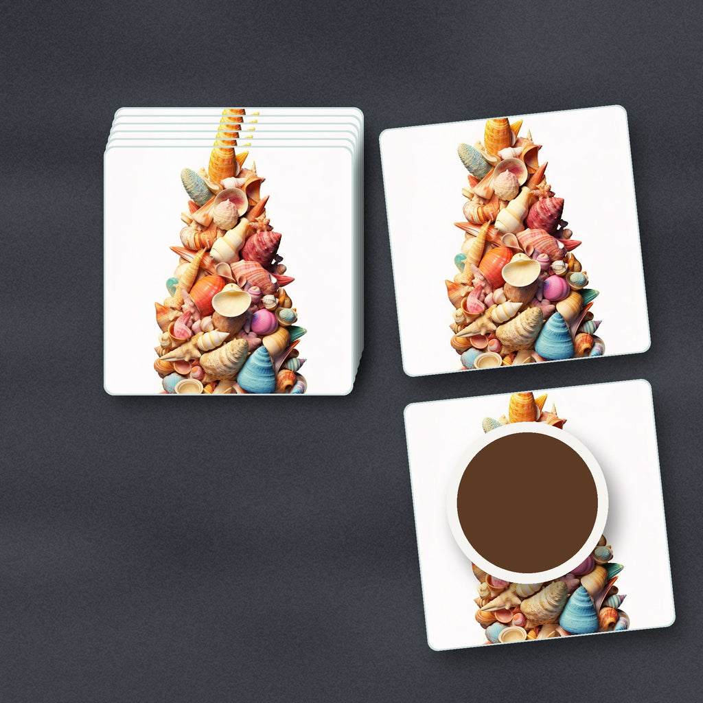 Seashell Tower square glass coasters stacked on a slate kitchen worktop