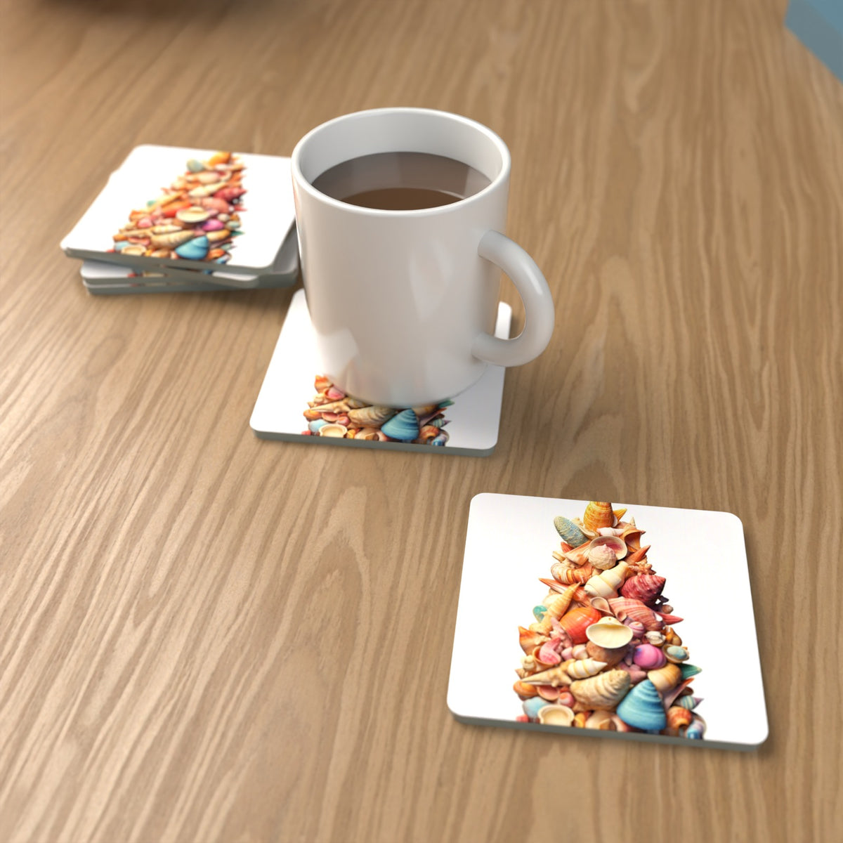 Seashell Tower Square Glass Coasters – Set of 6 – lifestyle mockup with a mug of coffee