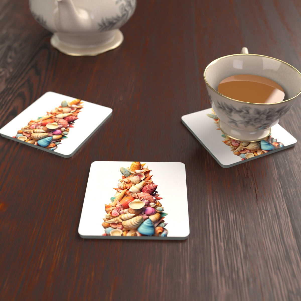 Seashell Tower Square Glass Coasters – Set of 6 – lifestyle mockup with a teacup
