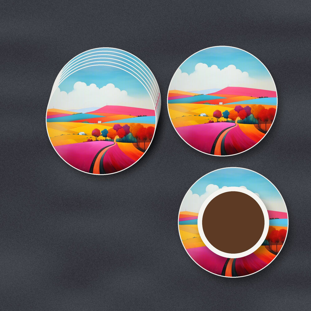 Bright Patchwork Hills round ceramic coasters stacked on a slate kitchen worktop