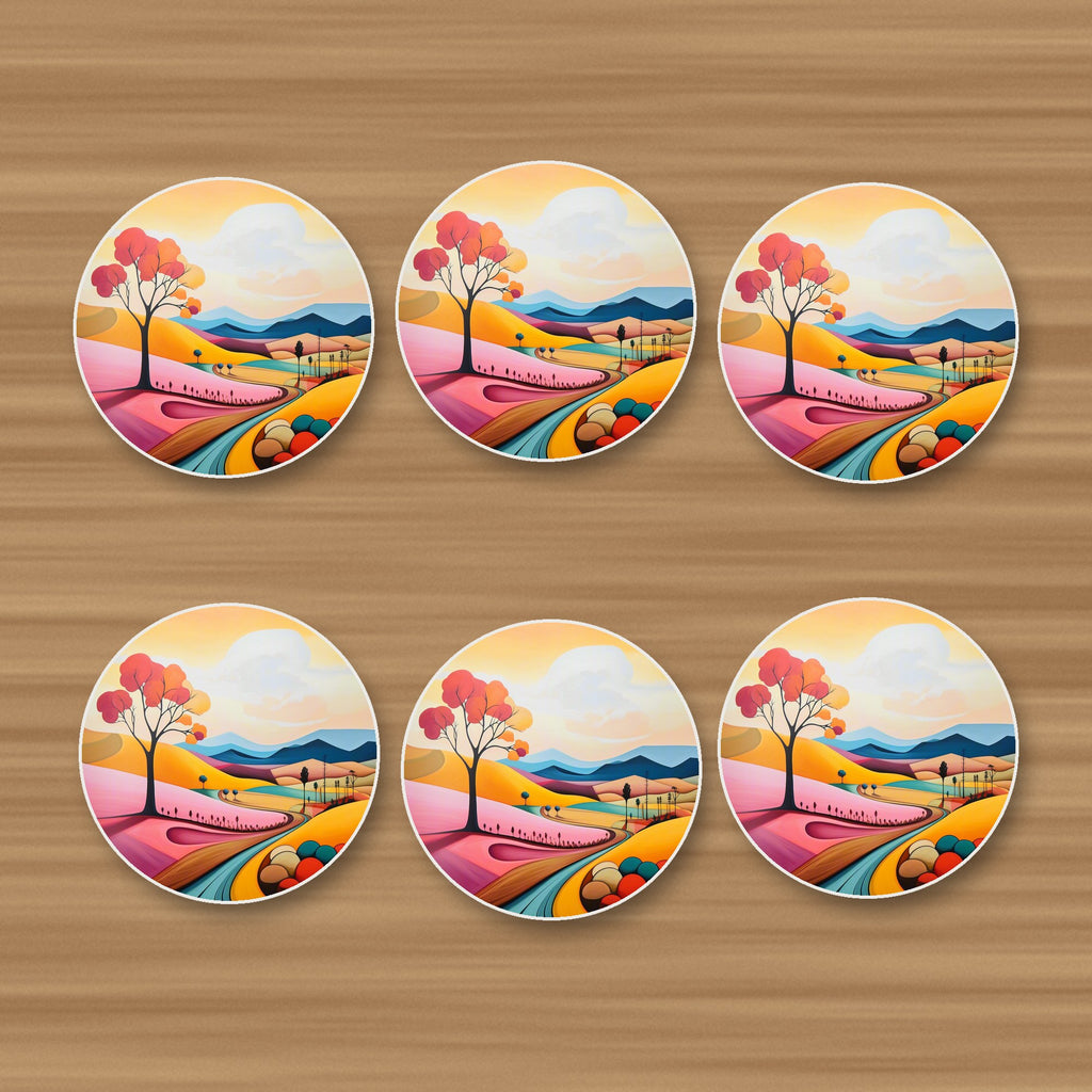 Colourful Hills & Red Tree round ceramic coasters, set of 6, on an oak coffee table