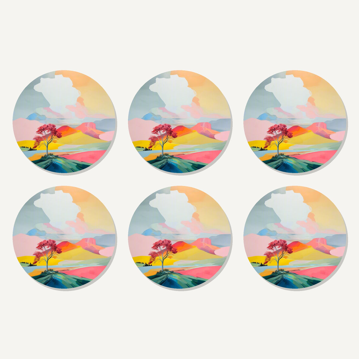 Flat lay of the lone pink tree on the hill artwork on six round coasters