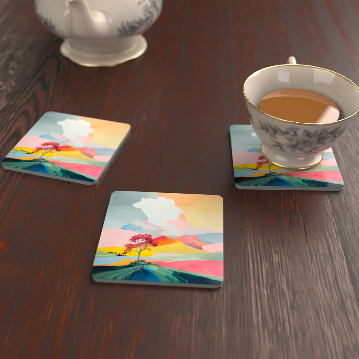 Lone Pink Tree on the Hill Square Glass Coasters – Set of 6 – lifestyle mockup with a teacup