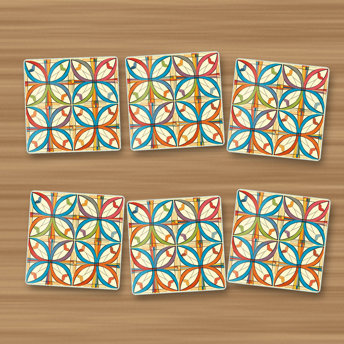 Retro Quatrefoil Tile Pattern square glass coasters, set of 6, on an oak coffee table