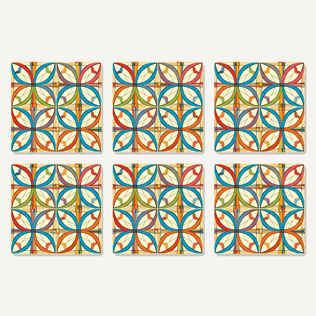 Flat lay of the retro quatrefoil tile pattern artwork on six square coasters