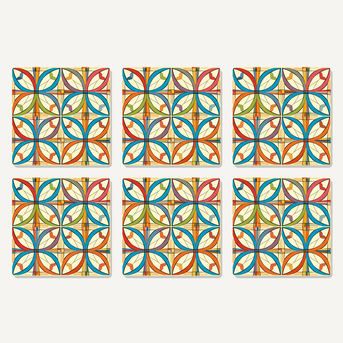 Flat lay of the retro quatrefoil tile pattern artwork on six square coasters
