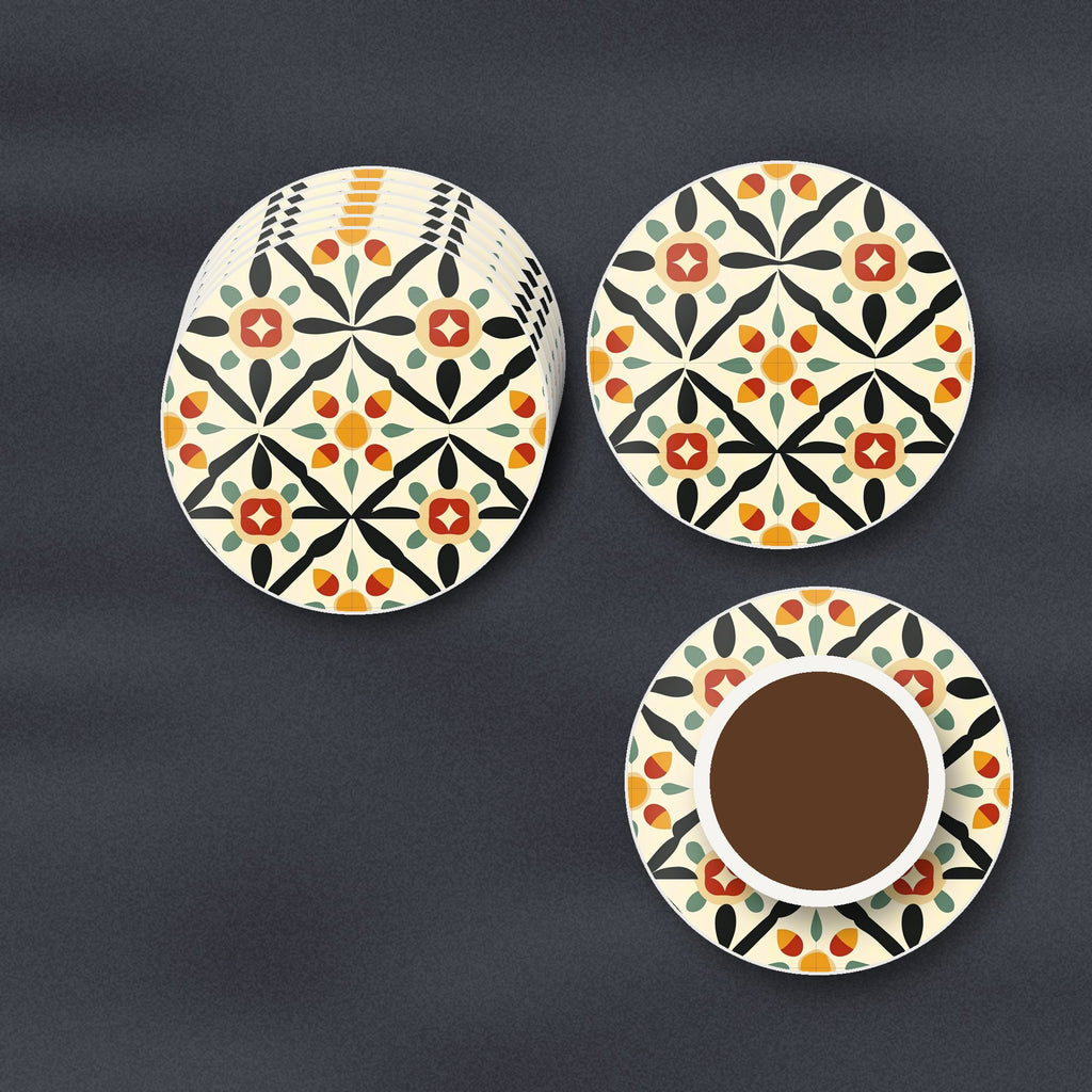 Black & Cream Floral Tile round ceramic coasters stacked on a slate kitchen worktop