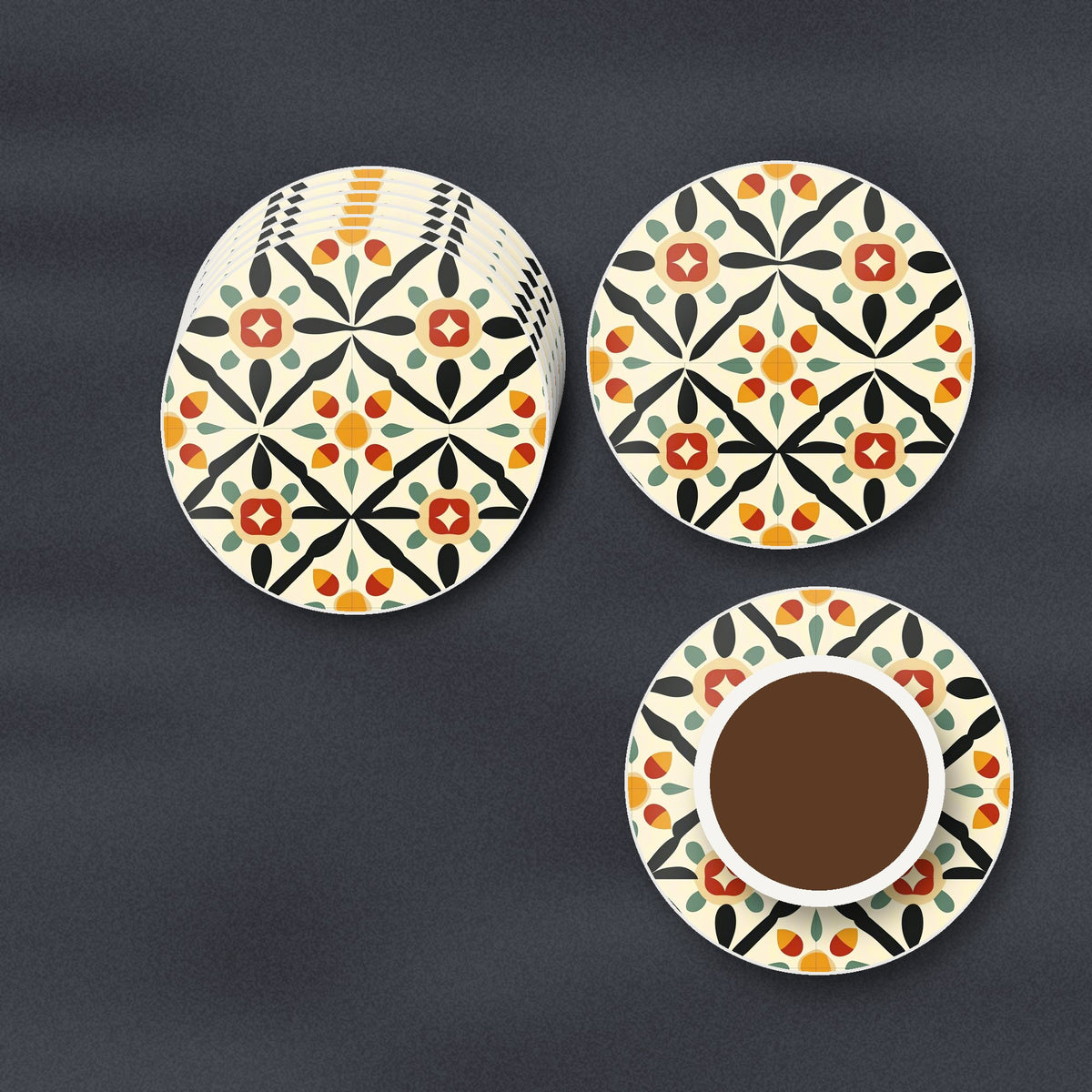 Black & Cream Floral Tile round ceramic coasters stacked on a slate kitchen worktop