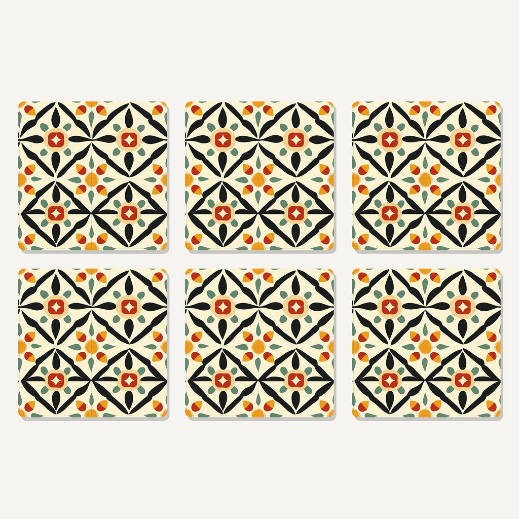 Flat lay of the black & cream floral tile artwork on six square coasters