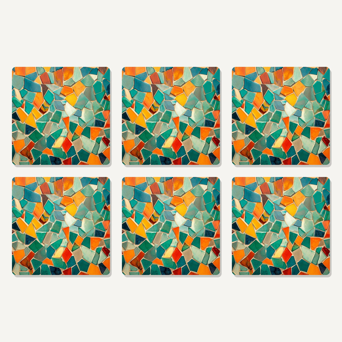 Flat lay of the broken tile mosaic artwork on six square coasters