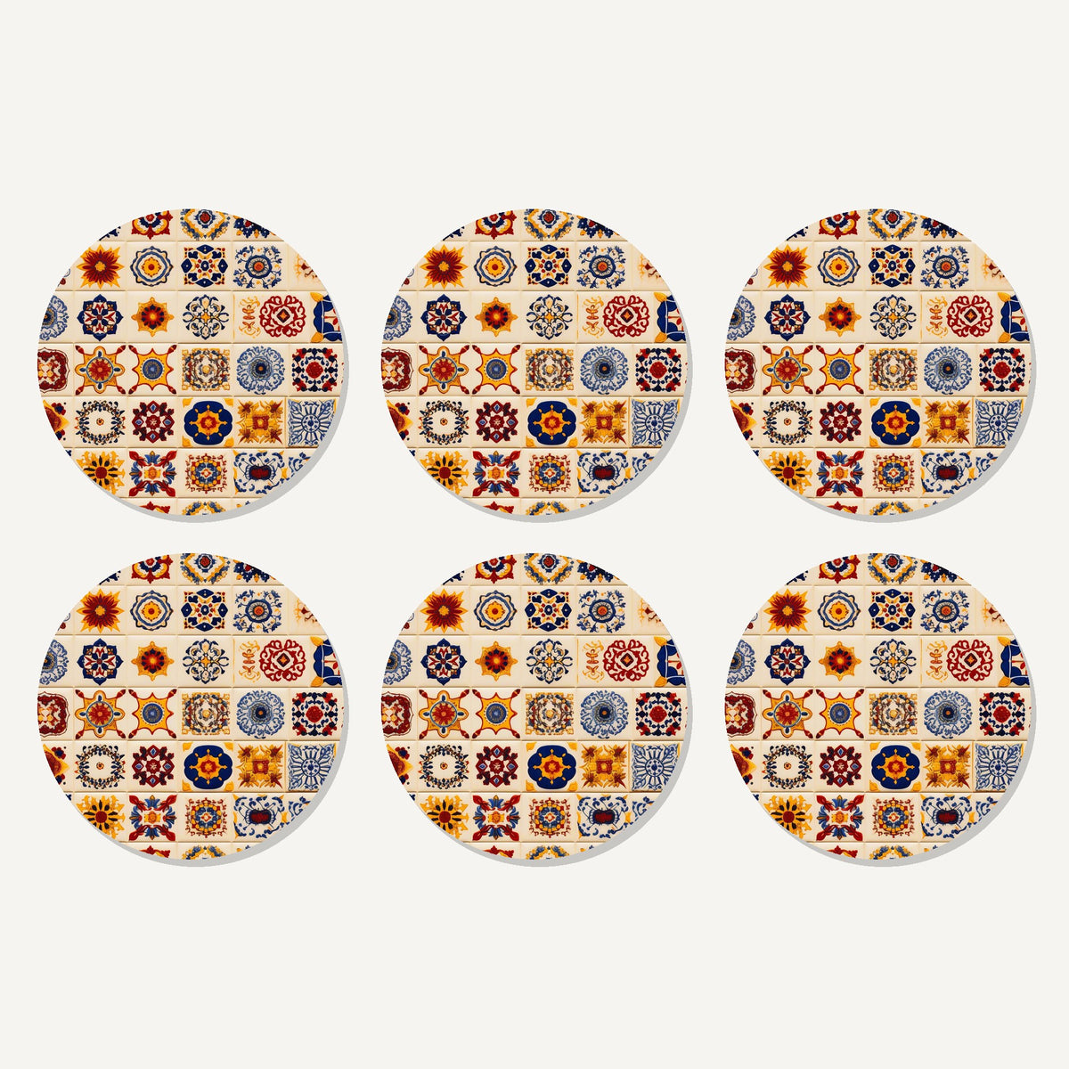 Flat lay of the blue & orange patterned tiles artwork on six round coasters