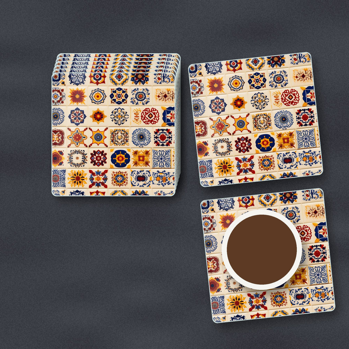 Blue & Orange Patterned Tiles square glass coasters stacked on a slate kitchen worktop