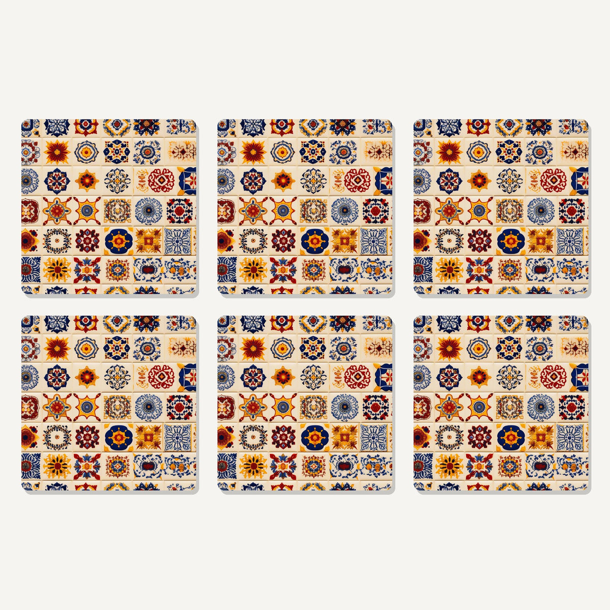 Flat lay of the blue & orange patterned tiles artwork on six square coasters