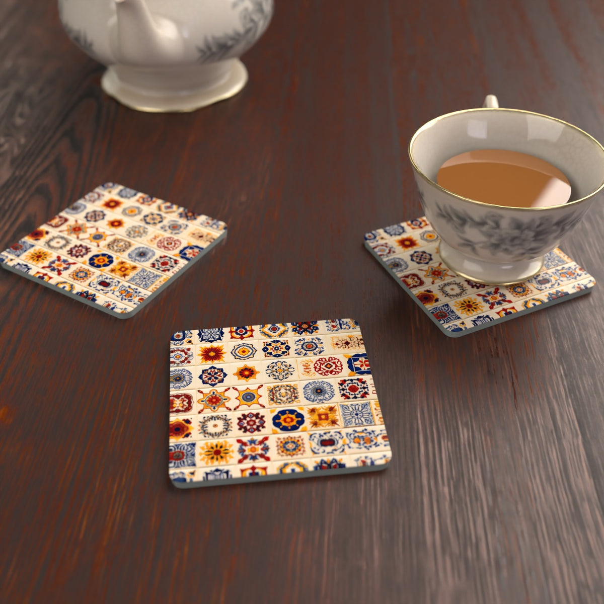 Blue & Orange Patterned Tiles Square Glass Coasters – Set of 6 – lifestyle mockup with a teacup