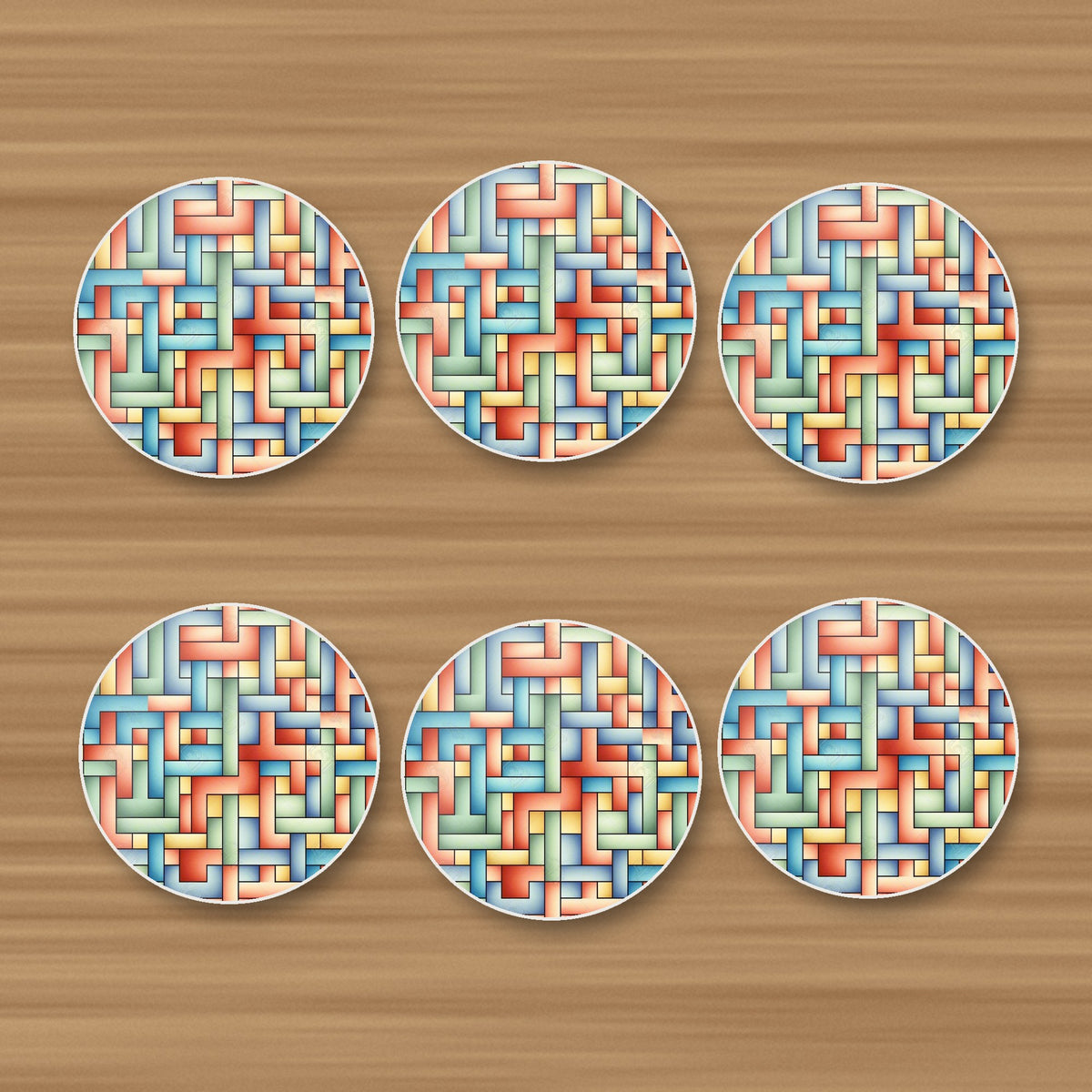 Pastel Basket Weave round ceramic coasters, set of 6, on an oak coffee table