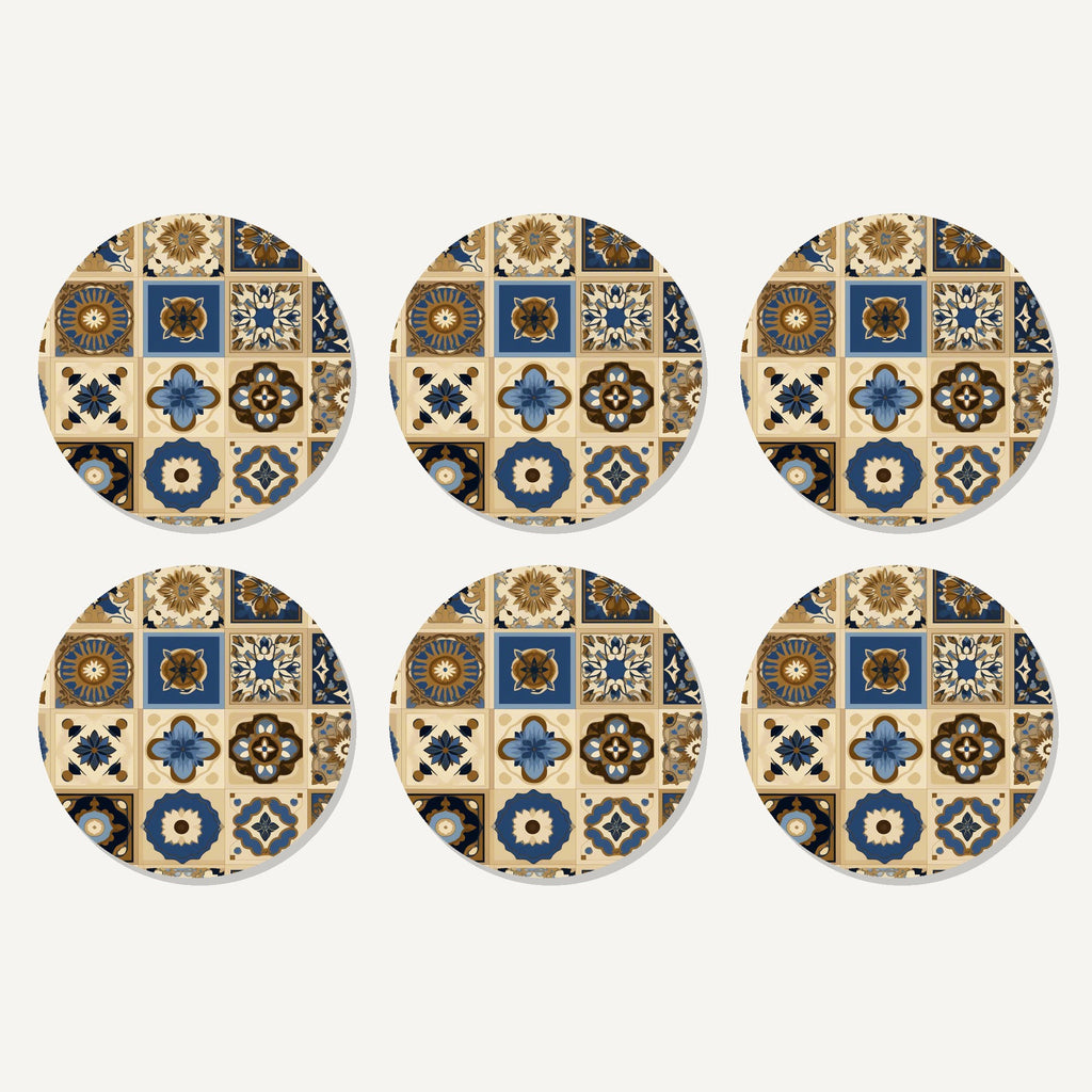 Flat lay of the navy & gold patterned tiles artwork on six round coasters