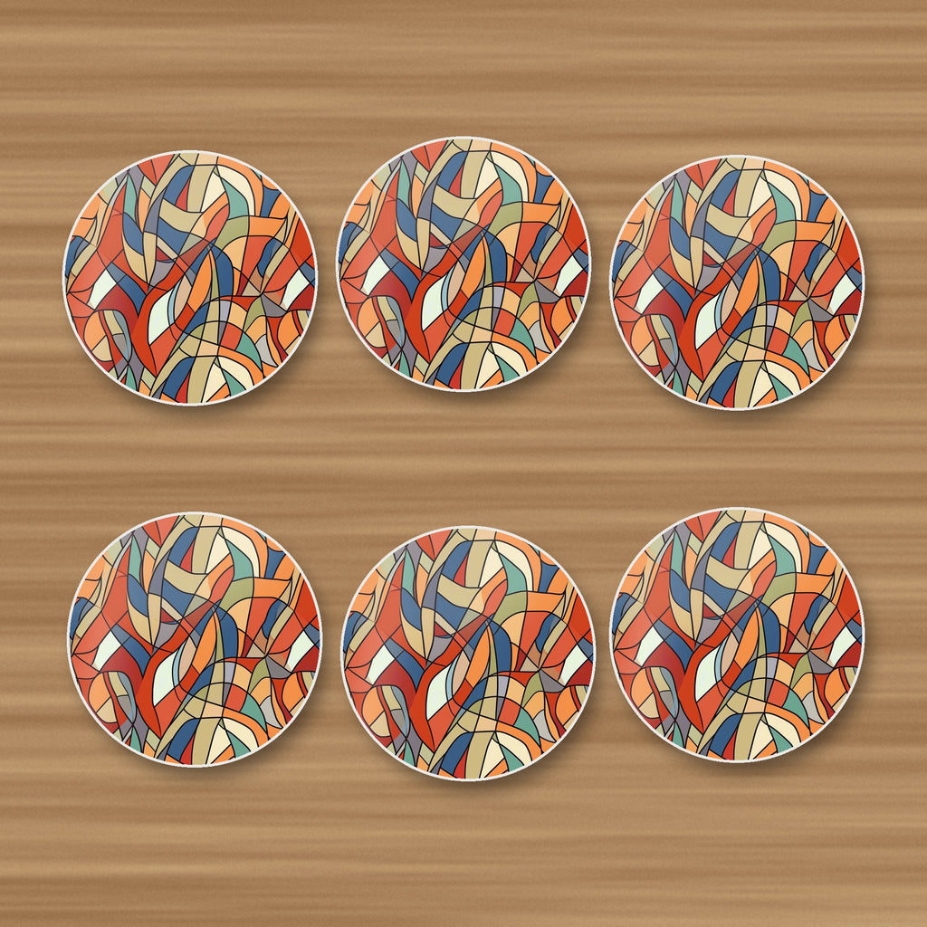 Stained Glass Swirl Abstract round ceramic coasters, set of 6, on an oak coffee table