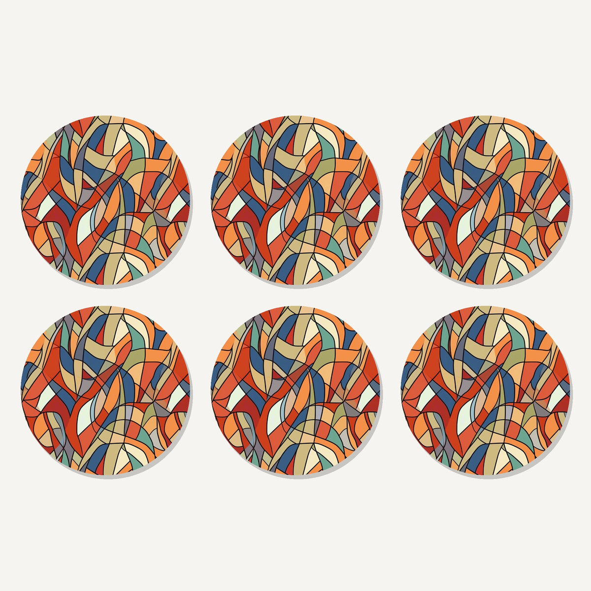 Flat lay of the stained glass swirl abstract artwork on six round coasters