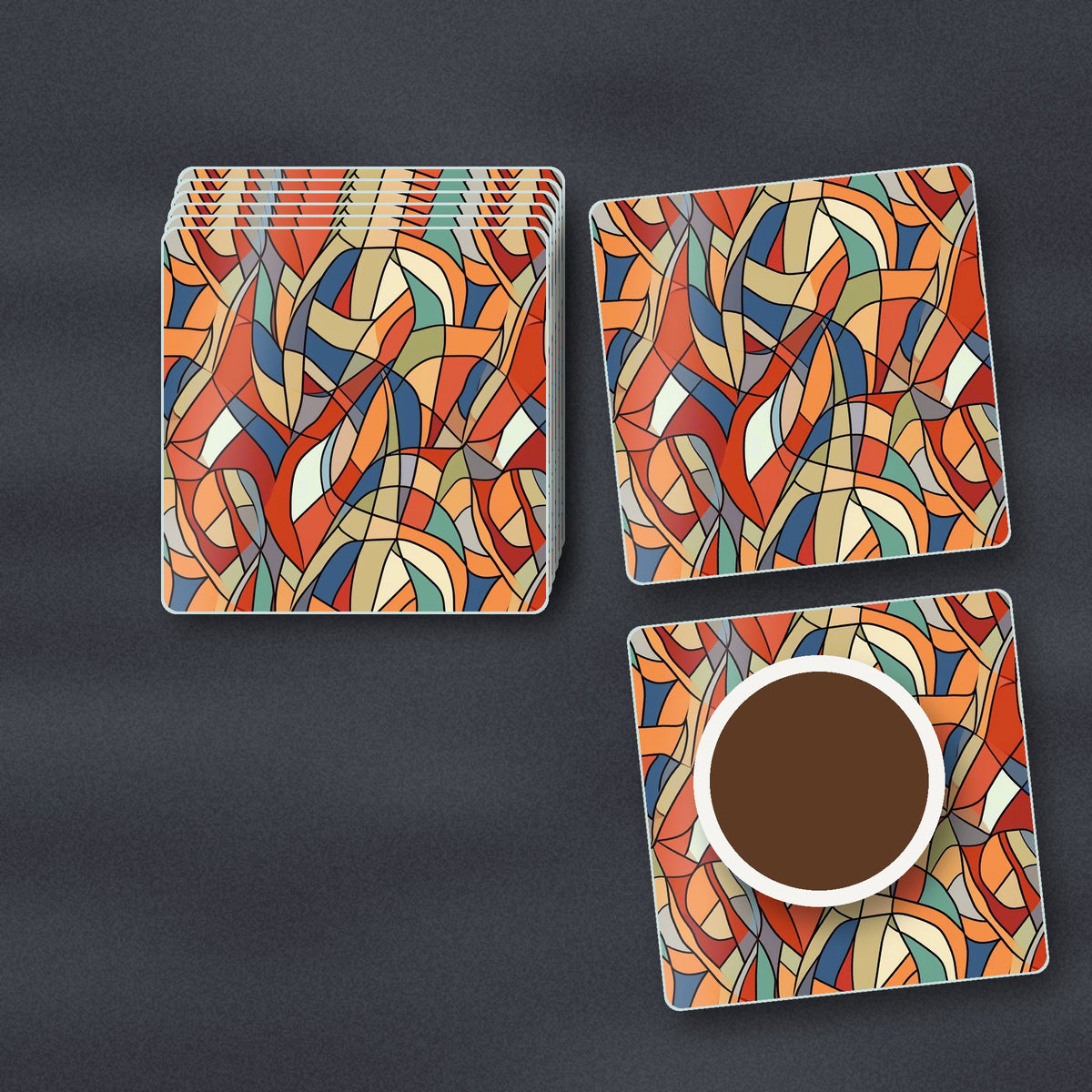 Stained Glass Swirl Abstract square glass coasters stacked on a slate kitchen worktop