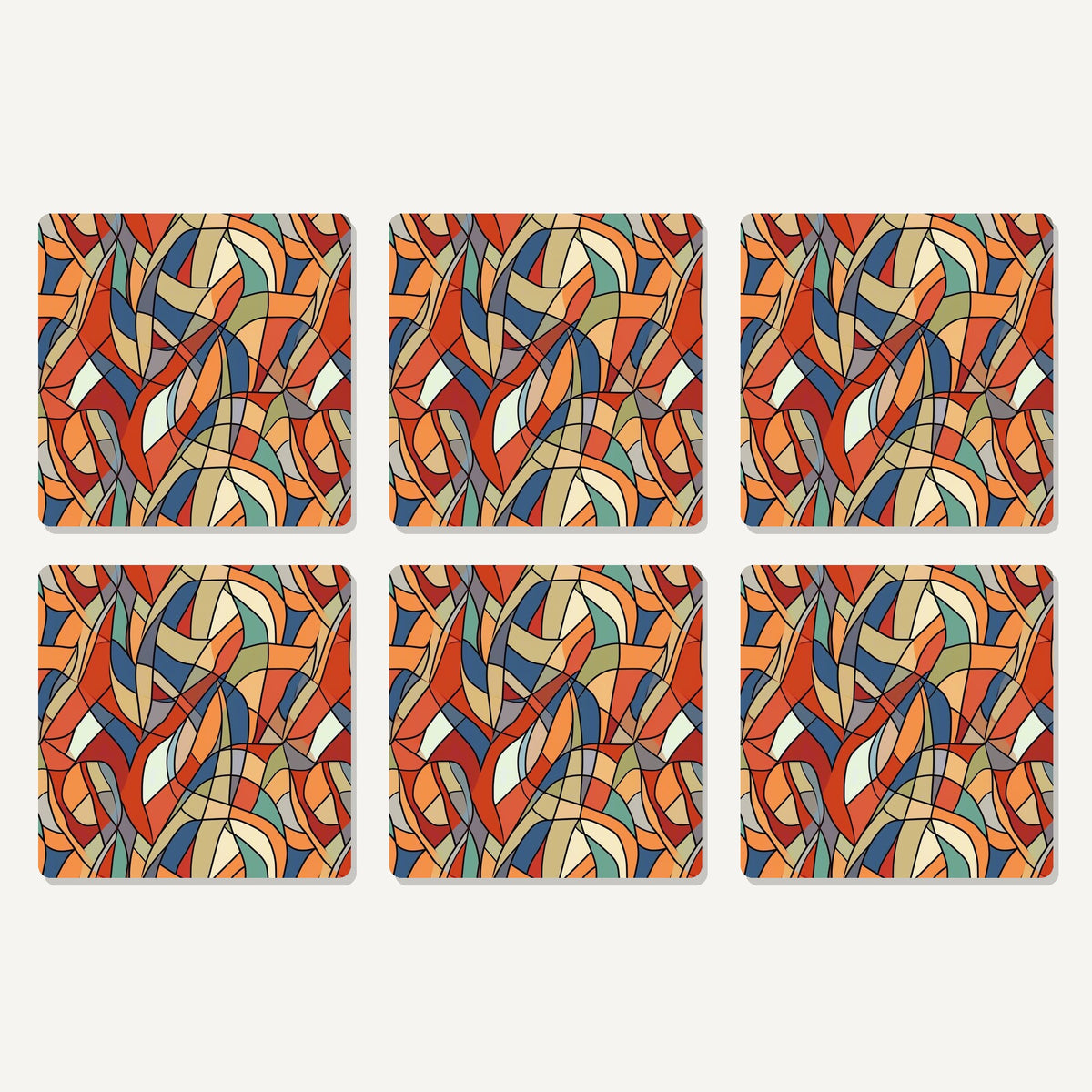 Flat lay of the stained glass swirl abstract artwork on six square coasters