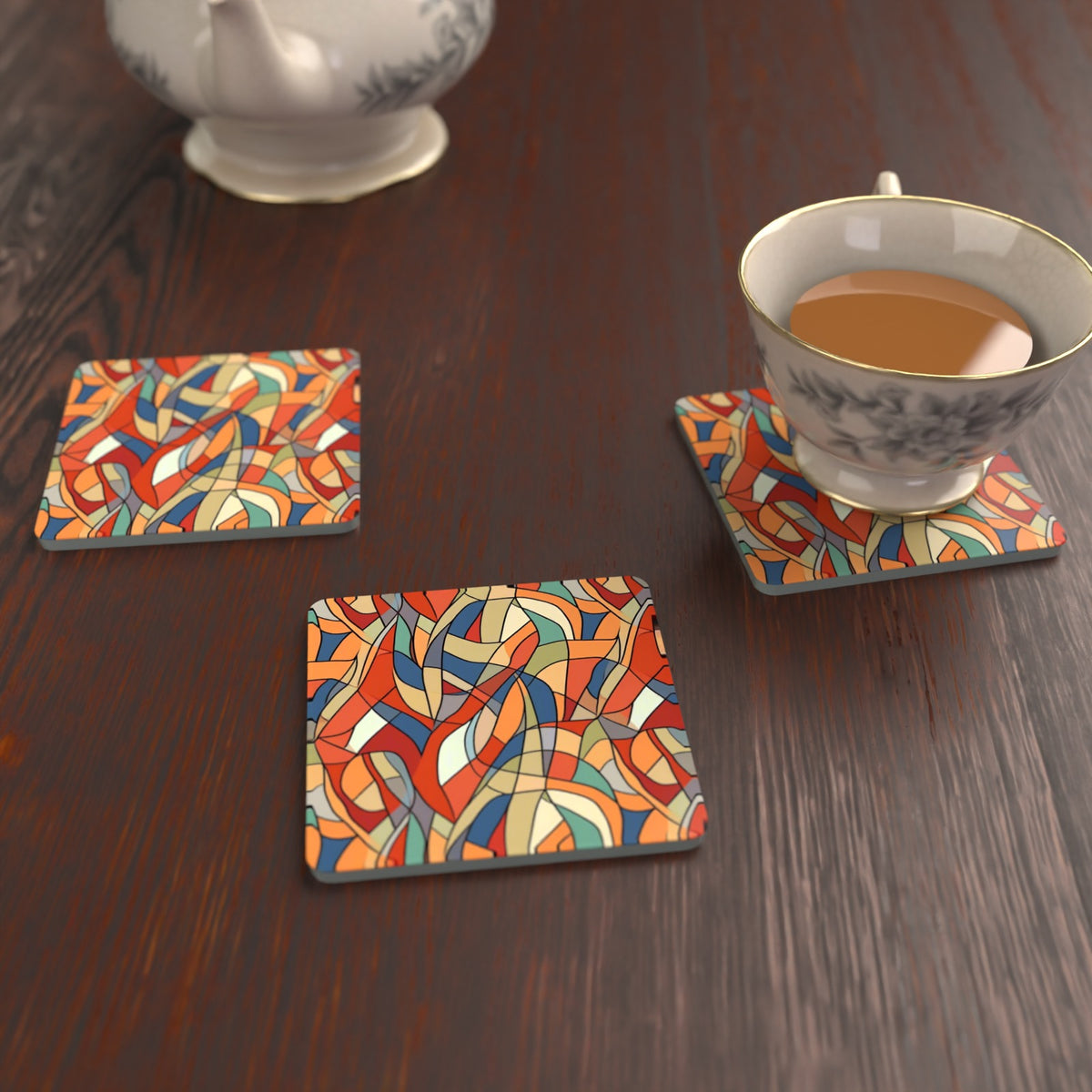 Stained Glass Swirl Abstract Square Glass Coasters – Set of 6 – lifestyle mockup with a teacup