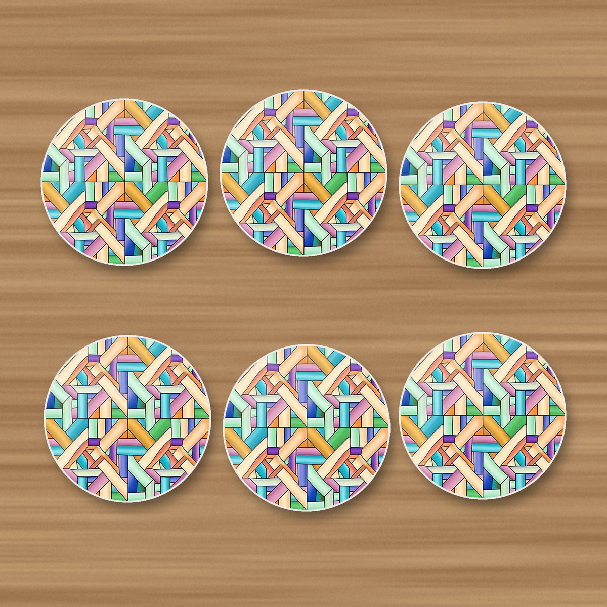 Pastel Woven Lattice round ceramic coasters, set of 6, on an oak coffee table