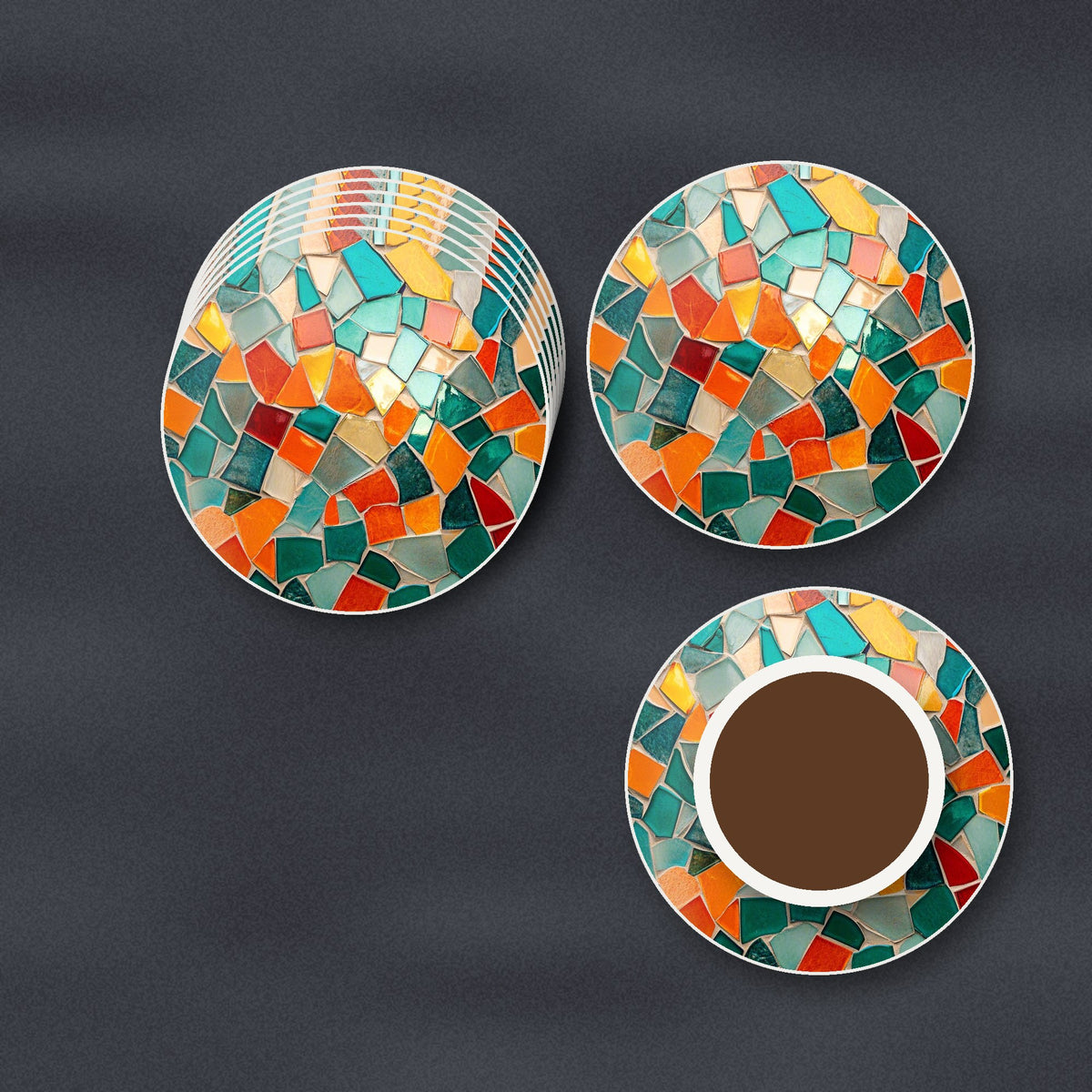 Teal & Orange Mosaic round ceramic coasters stacked on a slate kitchen worktop