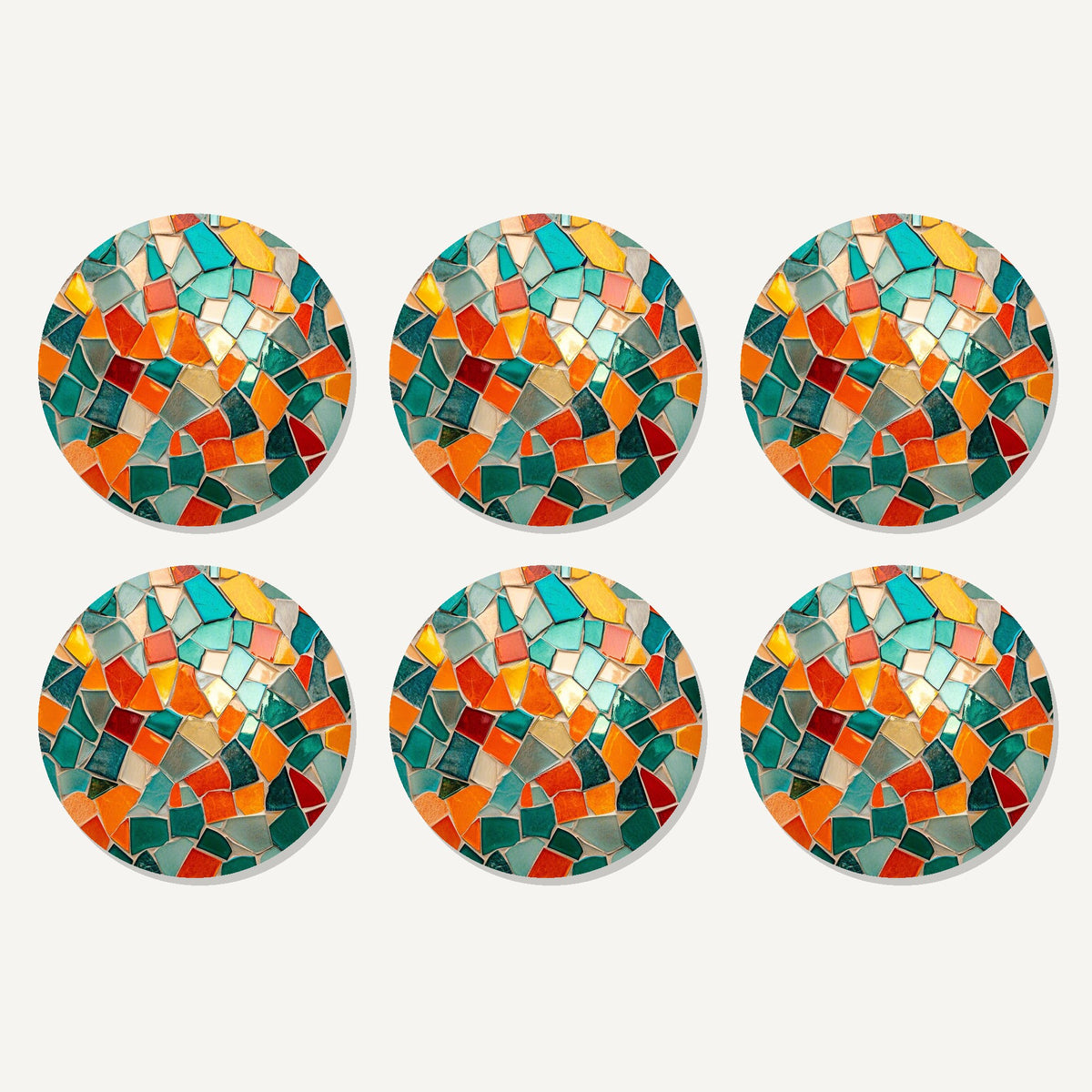 Flat lay of the teal & orange mosaic artwork on six round coasters