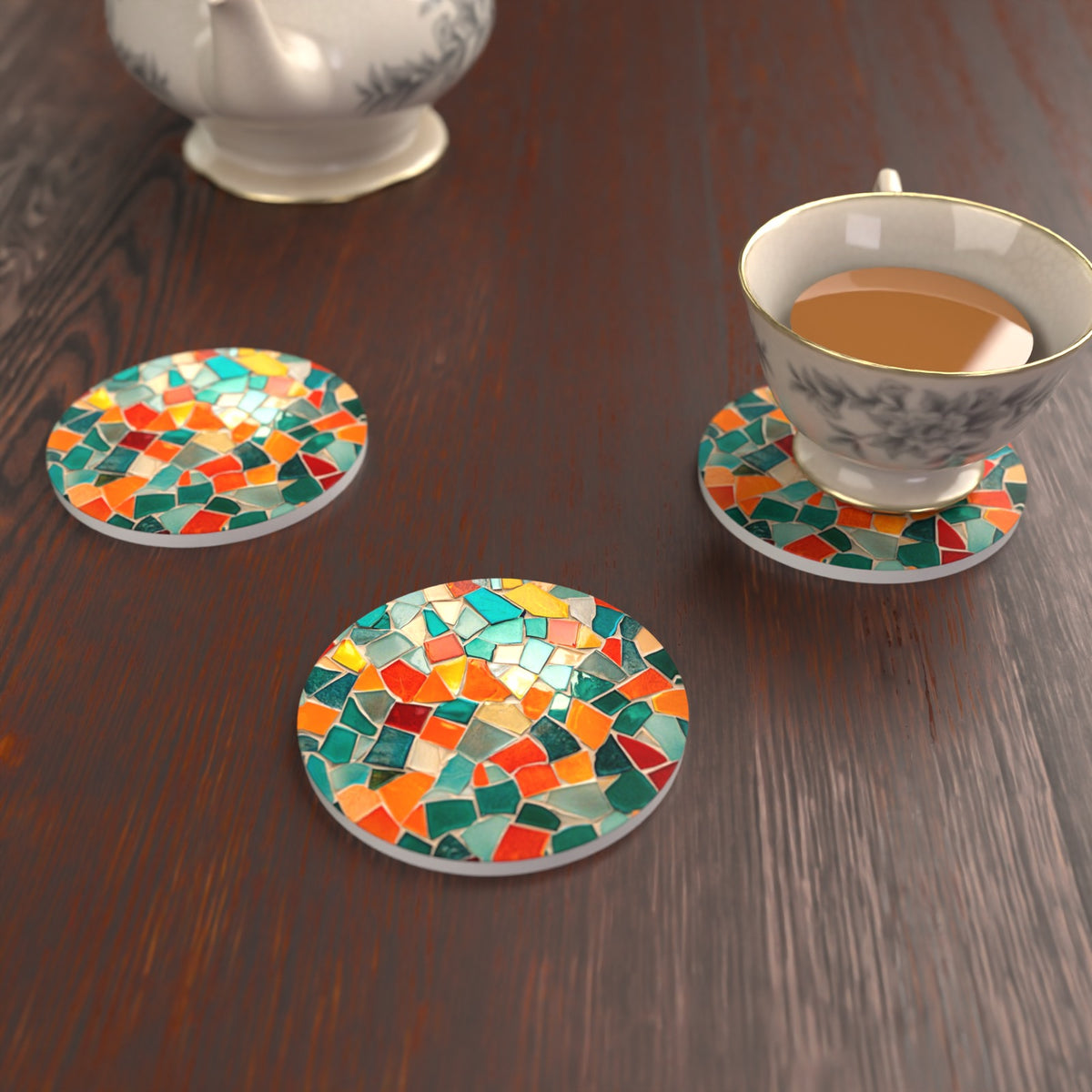 Teal & Orange Mosaic Round Ceramic Coasters – Set of 6 – lifestyle mockup with a teacup