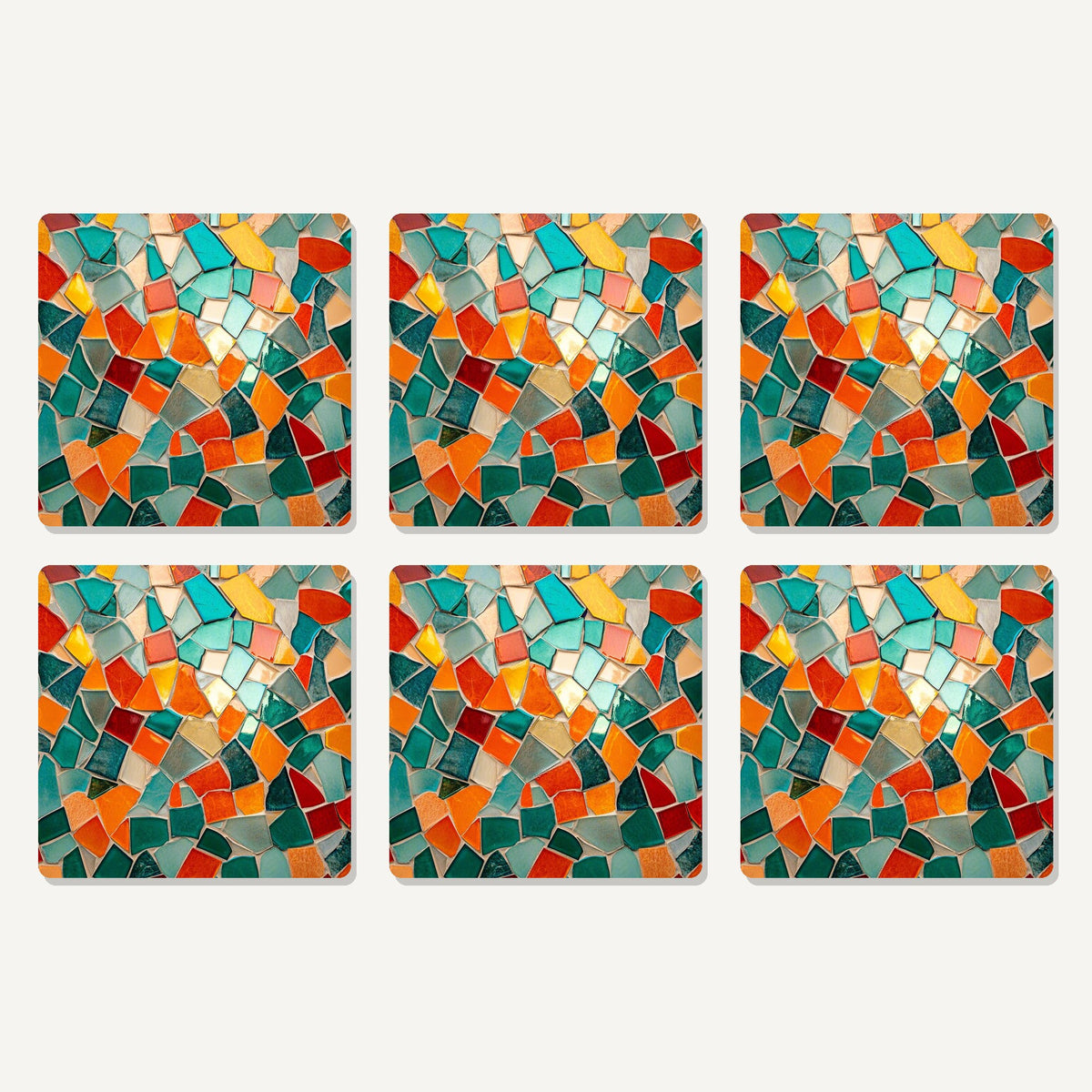 Flat lay of the teal & orange mosaic artwork on six square coasters