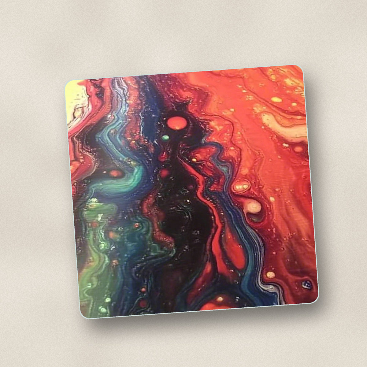 Close-up of one red & teal fluid art square glass coaster, flat UV print