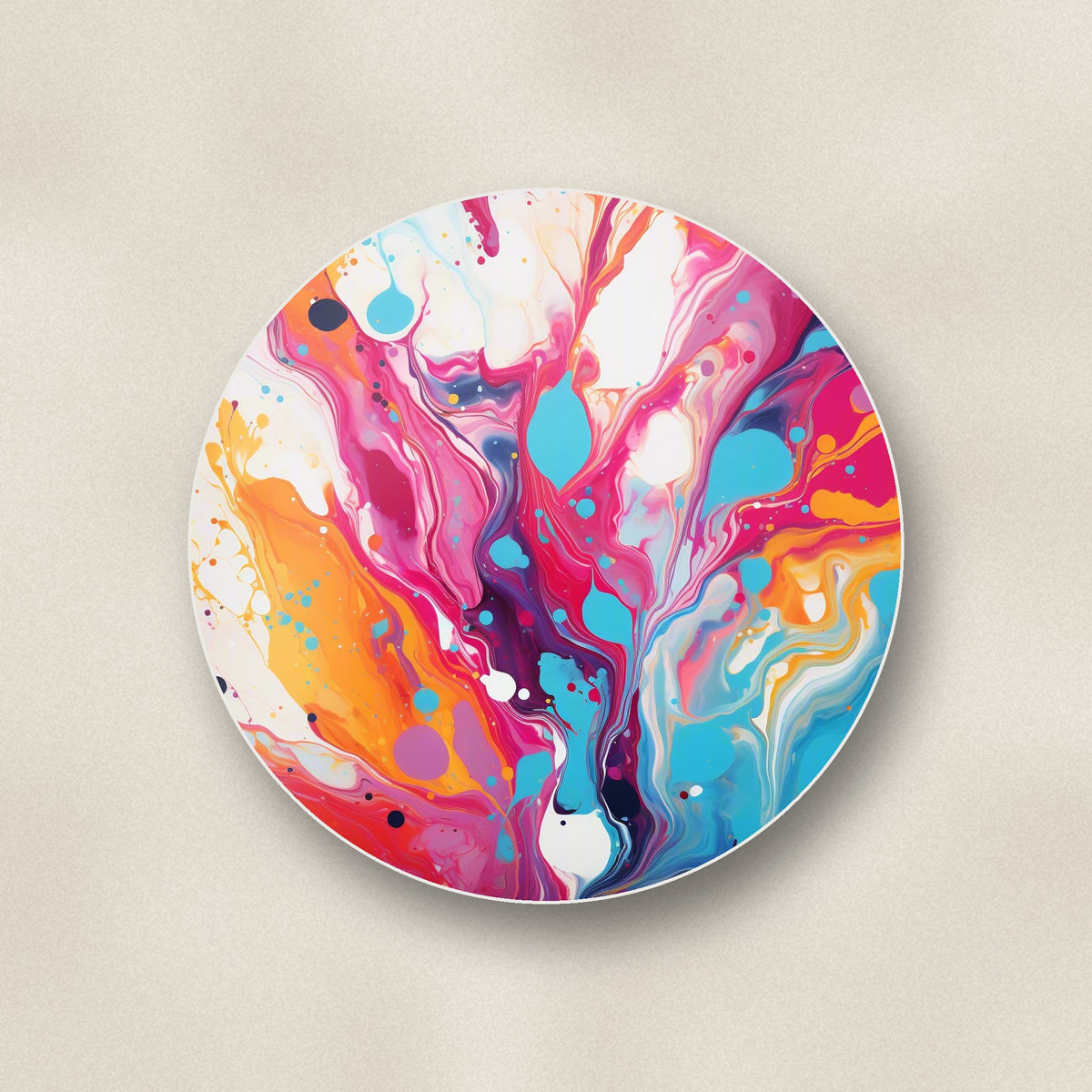 Close-up of one magenta & orange paint pour round ceramic coaster, flat UV print