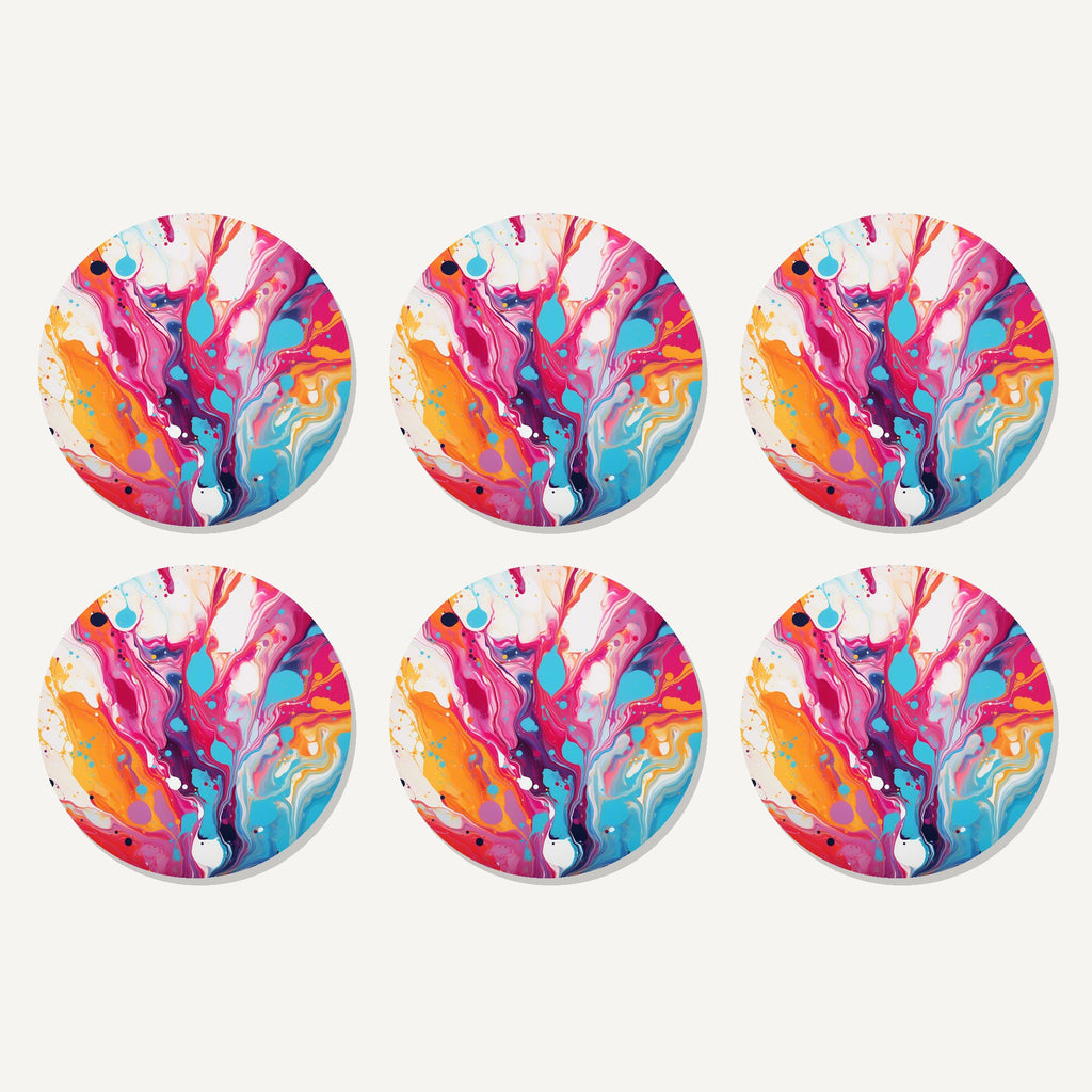Flat lay of the magenta & orange paint pour artwork on six round coasters