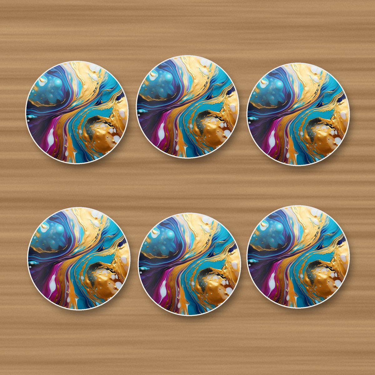 Blue & Gold Fluid Art round ceramic coasters, set of 6, on an oak coffee table