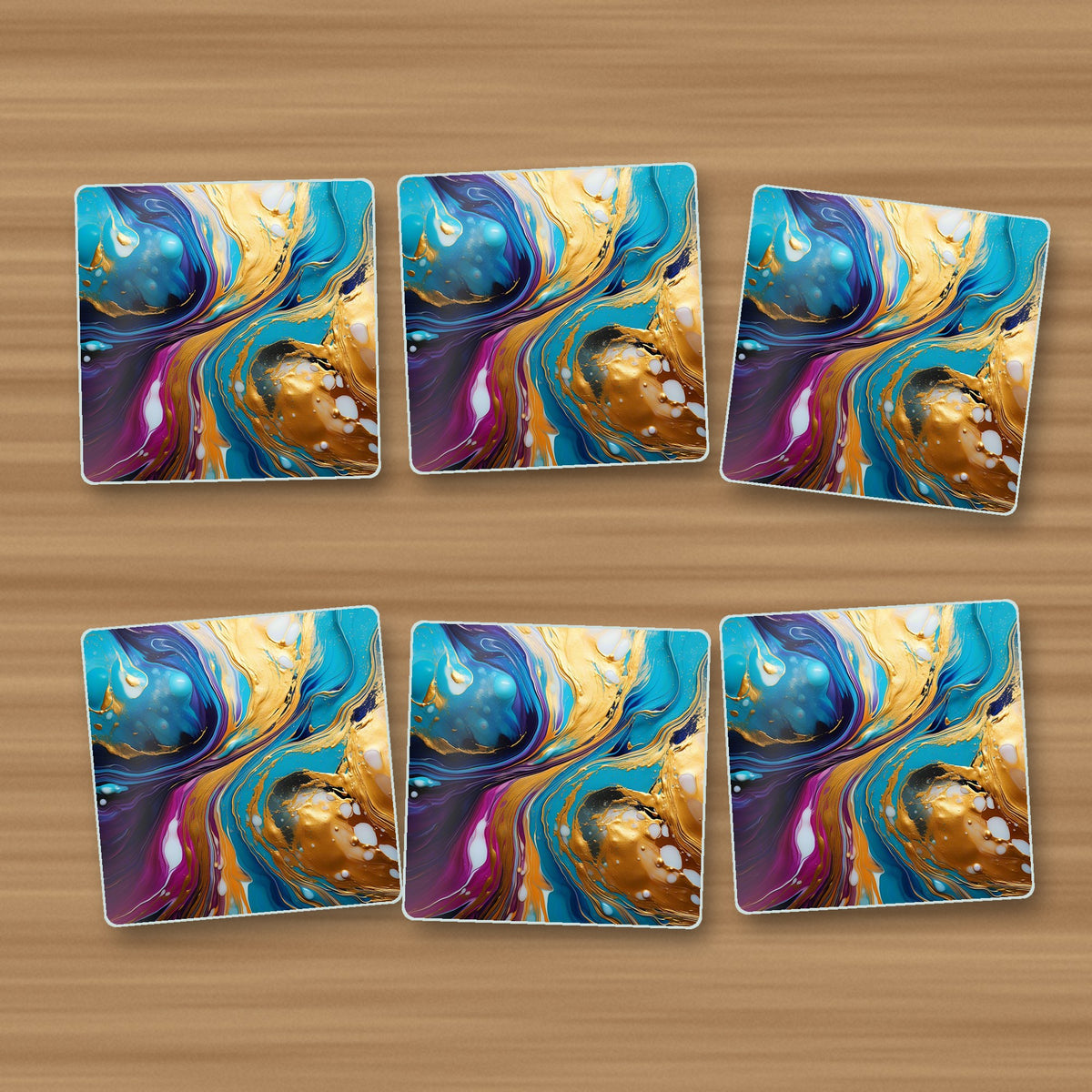 Blue & Gold Fluid Art square glass coasters, set of 6, on an oak coffee table
