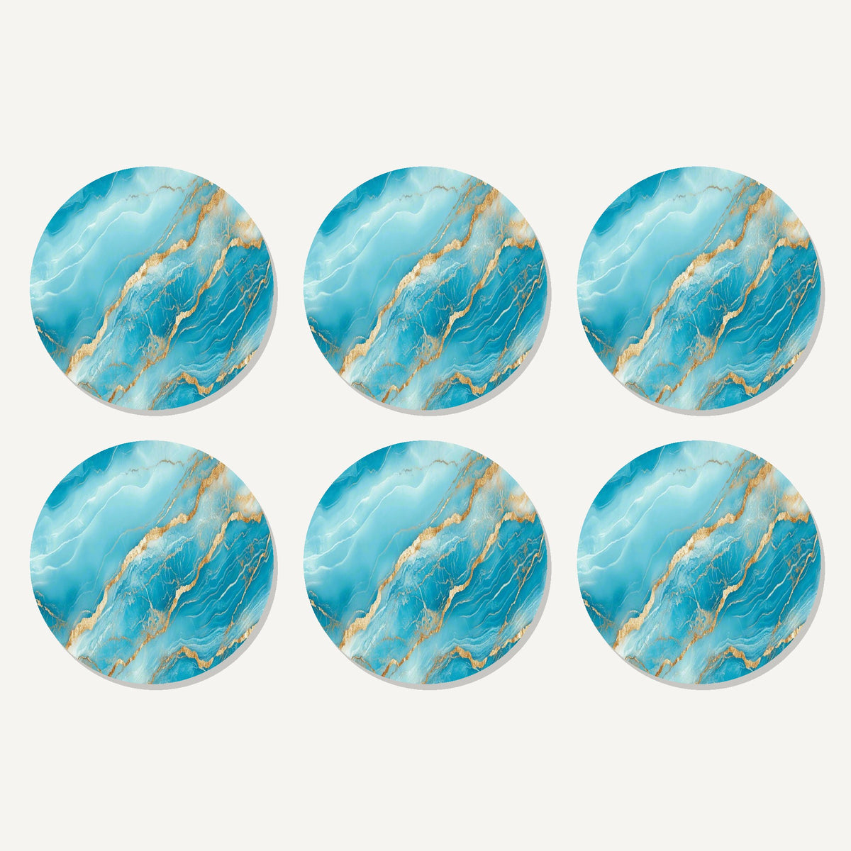 Flat lay of the turquoise & gold marble artwork on six round coasters