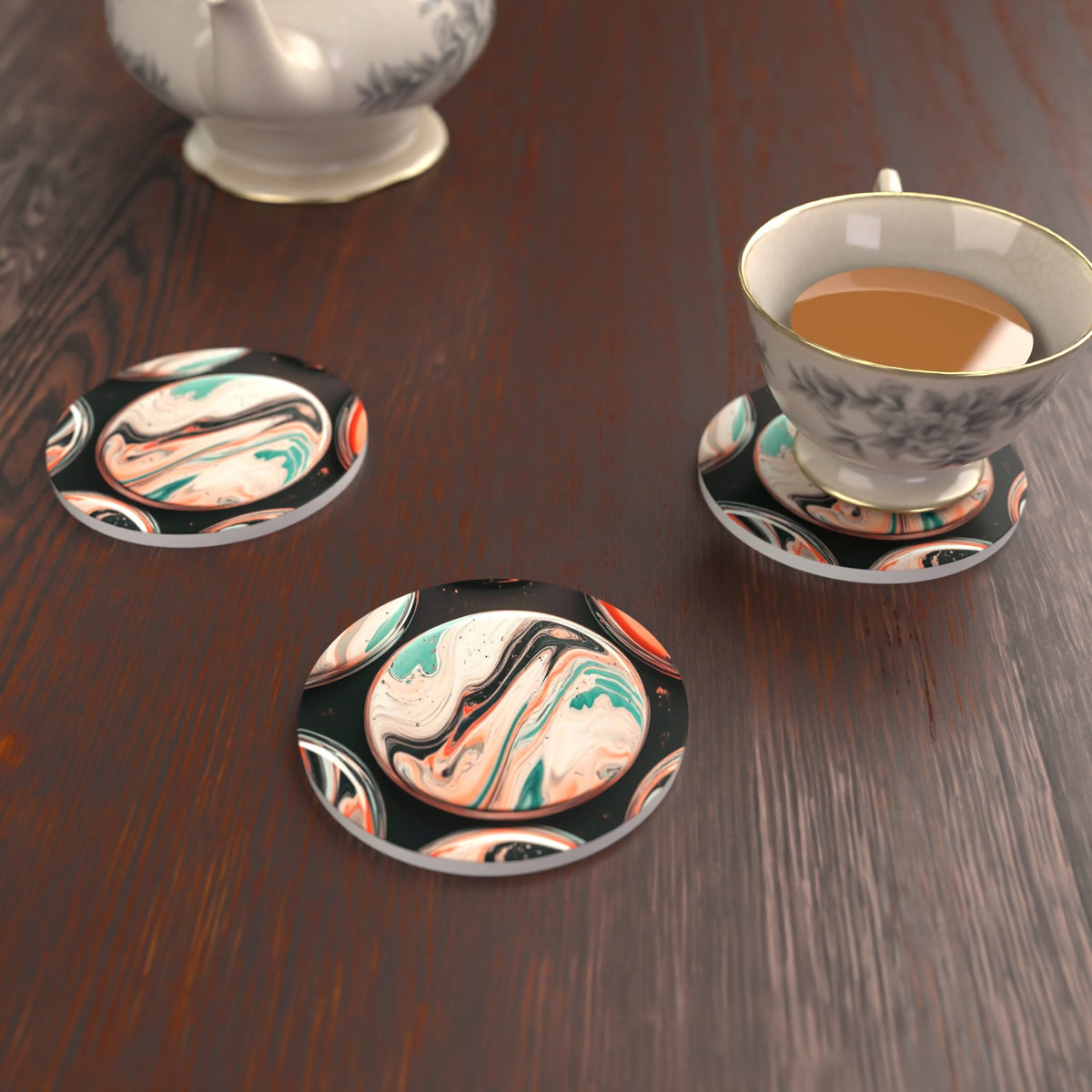 Marbled Discs on Black Round Ceramic Coasters – Set of 6 – lifestyle mockup with a teacup