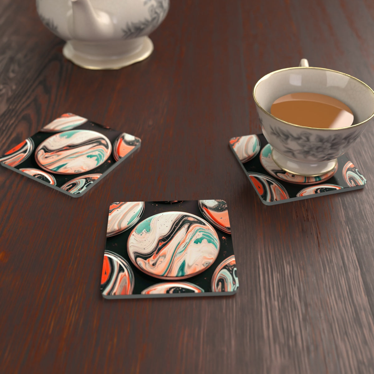 Marbled Discs on Black Square Glass Coasters – Set of 6 – lifestyle mockup with a teacup