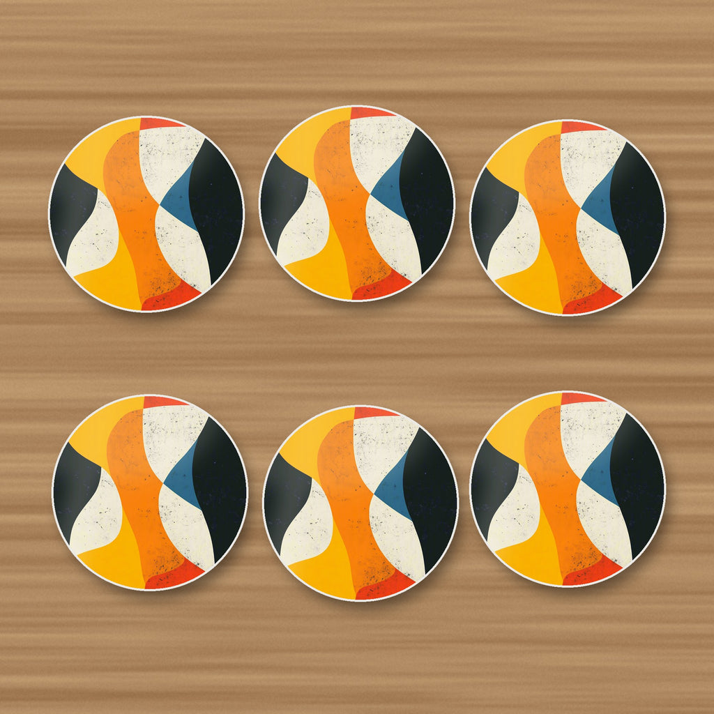 Mid-Century Abstract Shapes round ceramic coasters, set of 6, on an oak coffee table