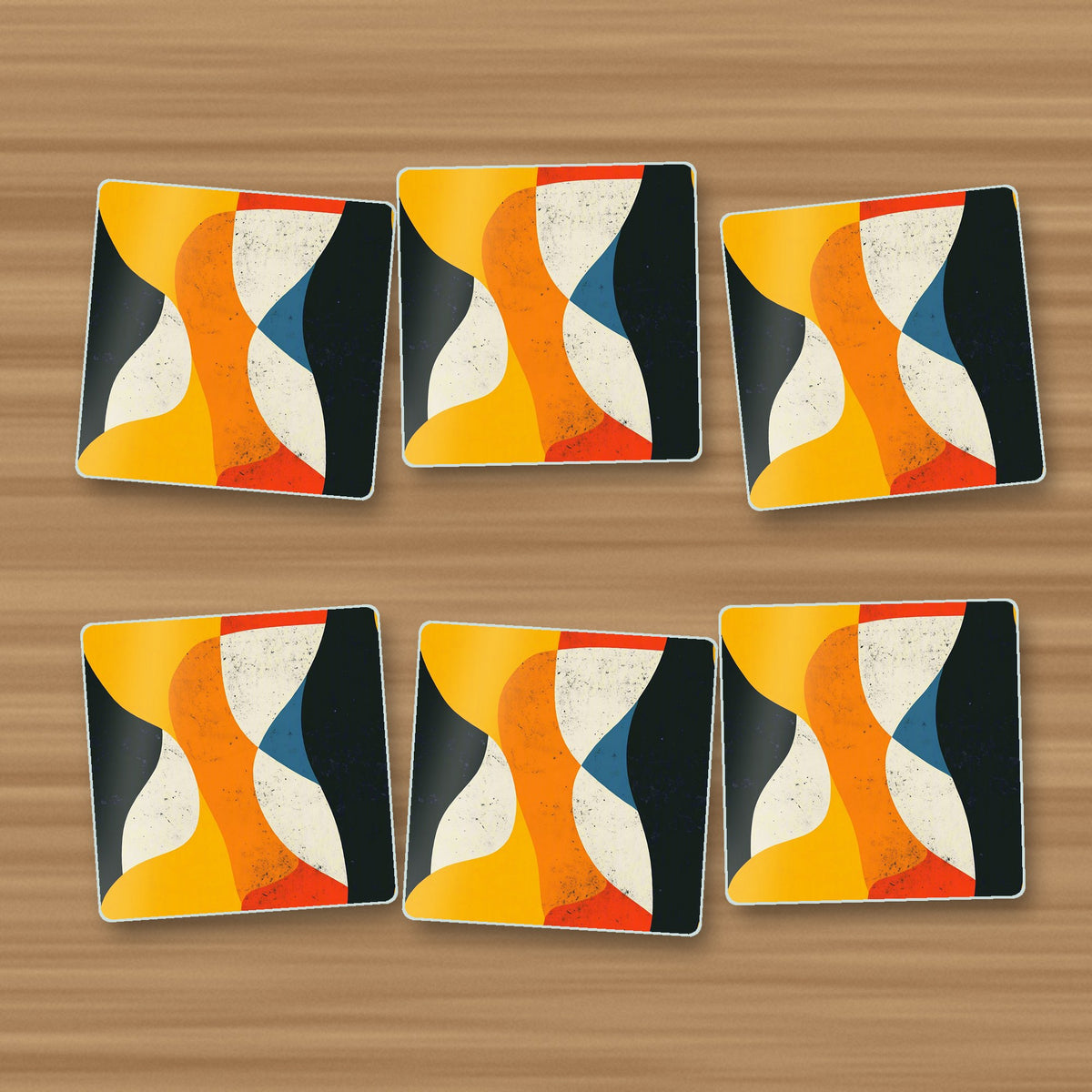 Mid-Century Abstract Shapes square glass coasters, set of 6, on an oak coffee table